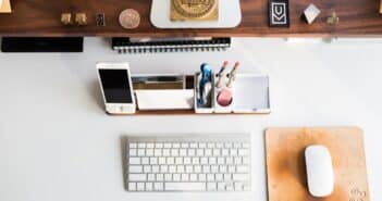 white Apple mouse beside keyboard