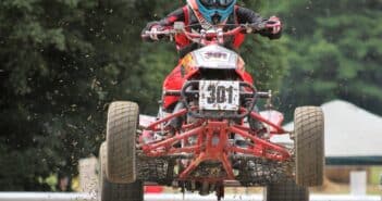 man riding ATV