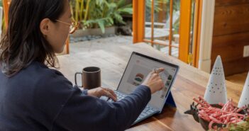 a woman using a laptop