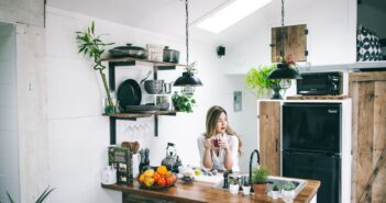 woman sitting in front of table