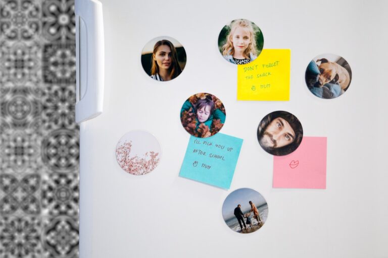 a refrigerator with magnets and pictures on it