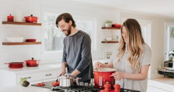 man and woman on kitchen