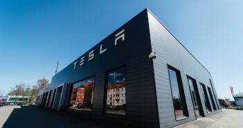 a building that has a tesla logo on it