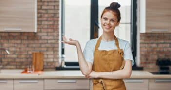 cheerful woman kitchen apartment kitchen utensils interior household concept