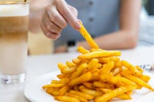 French fries with cheese in restaurant