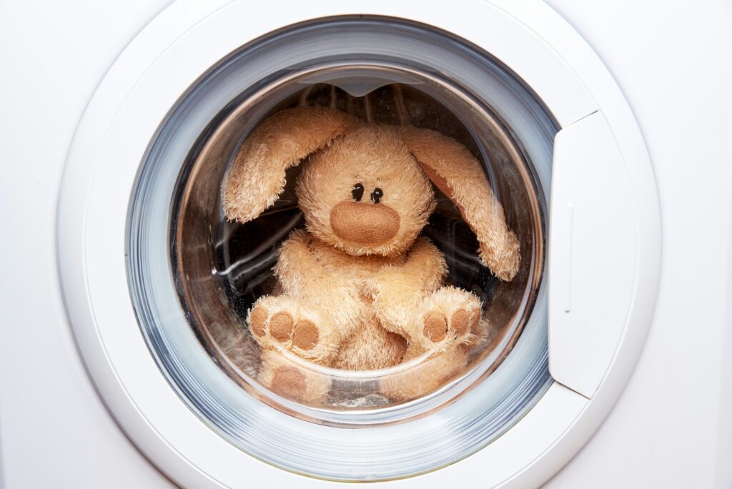 Stuffed rabbit in washing machine