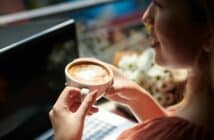 Woman Drinking Coffee in Coffeeshop