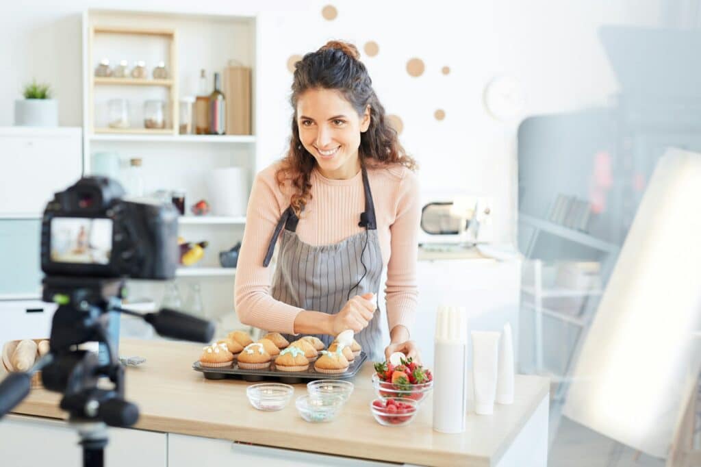 Joyful Woman Cooking On Camera