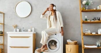 Spinning suds: woman on washing machine