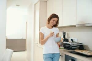 Woman beats blank for a dish in a deep plate