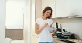 Woman beats blank for a dish in a deep plate