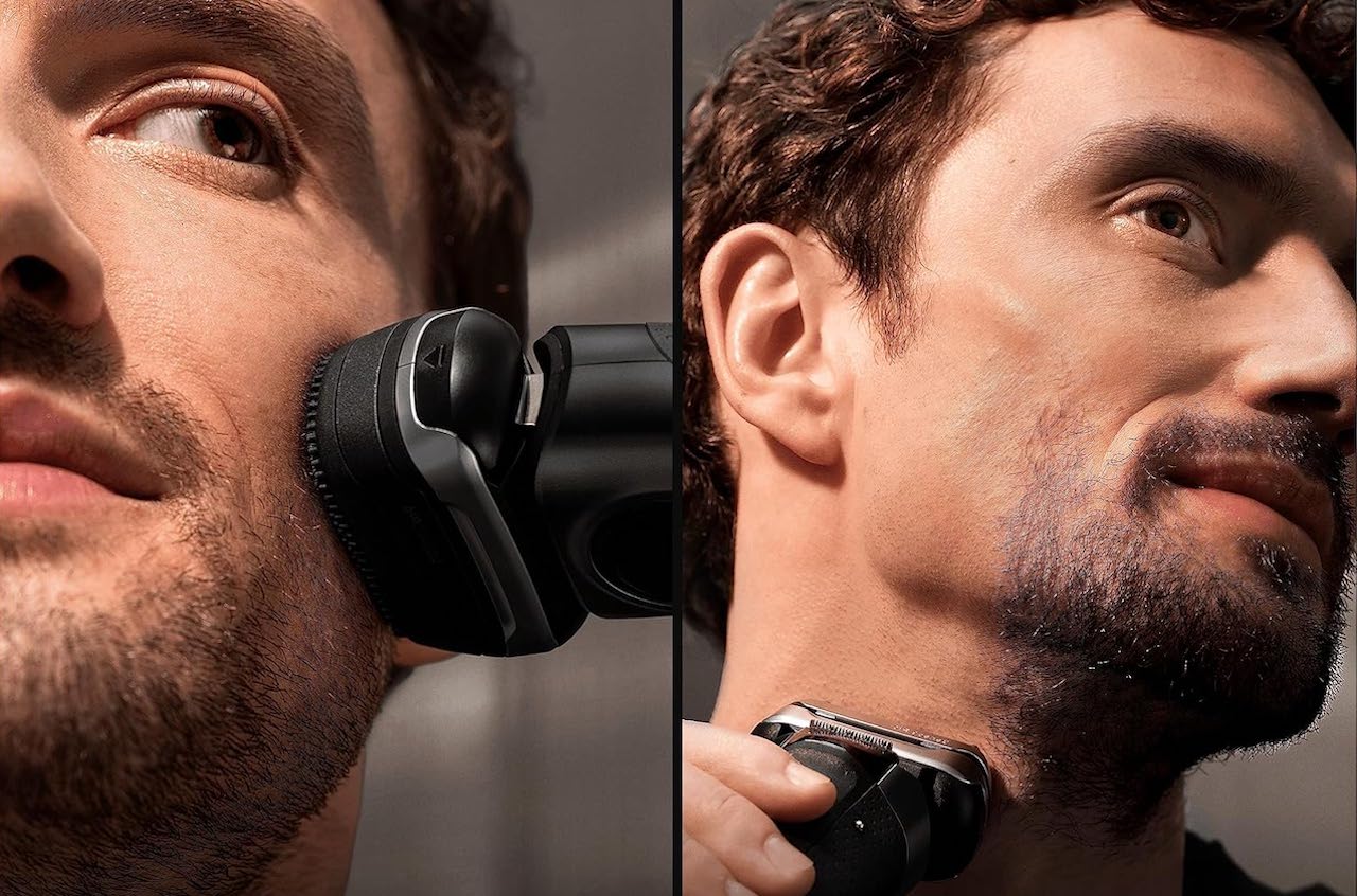Un homme qui se rase la barbe avec un rasoir électrique de la marque Braun.